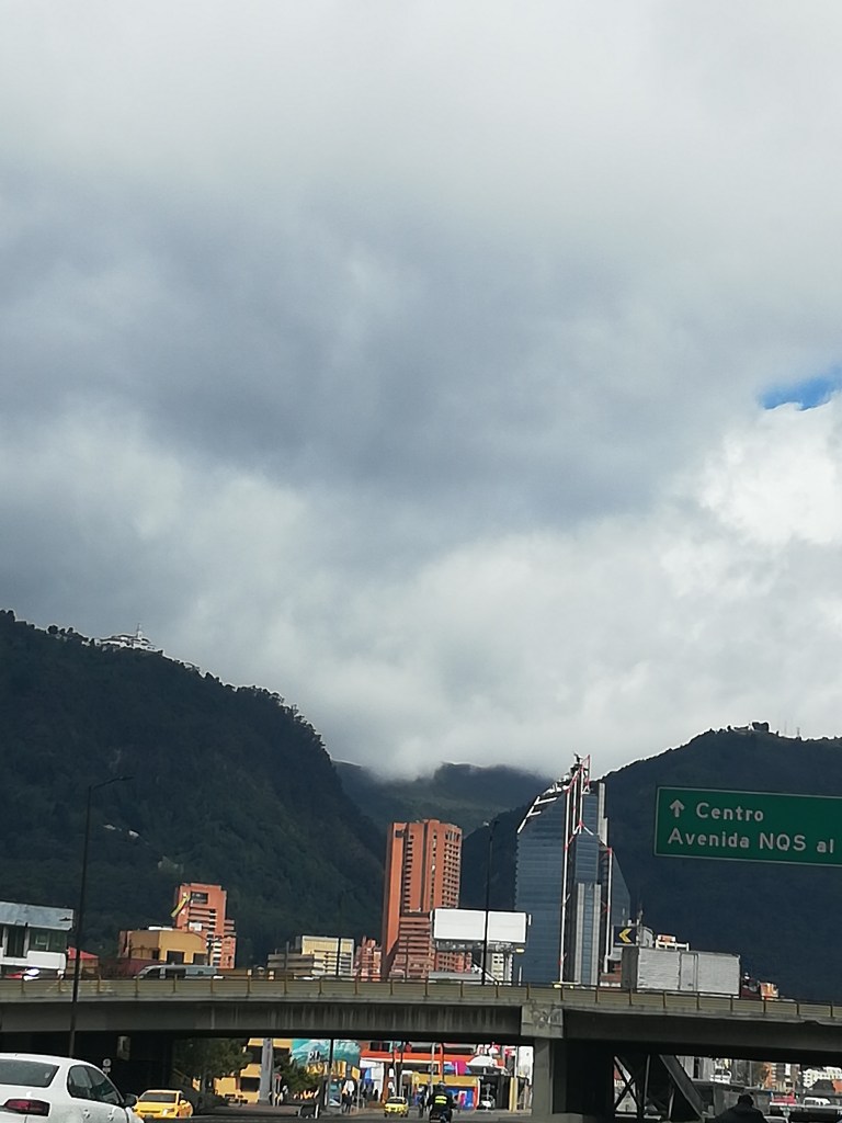 View of the eastern hills of Bogotá from Avenida 26 with NQS